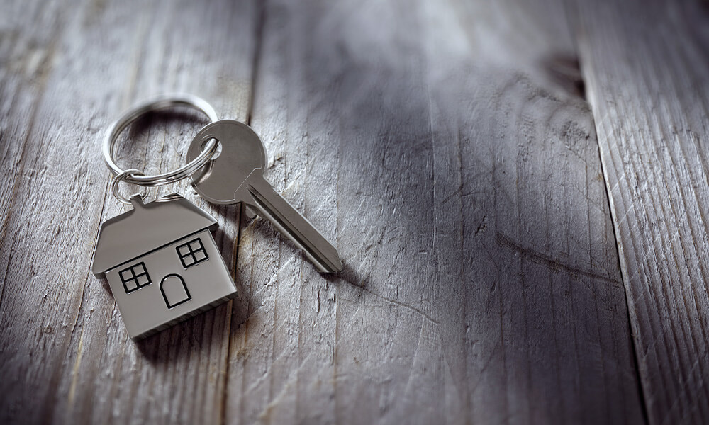 House key on a wooden table