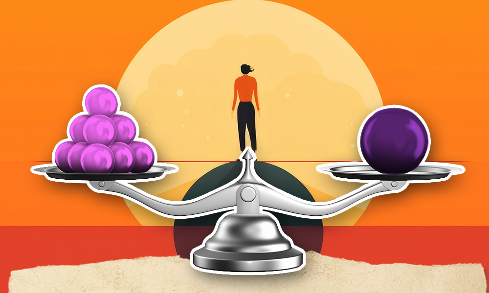 balance scale with several smalls balls weighing the same as one large ball