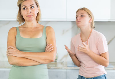 daughter pleading with her mother for money