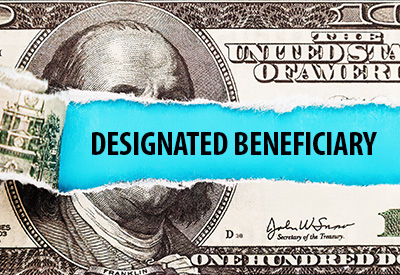 A torn U.S. dollar bill reveals the words 'DESIGNATED BENEFICIARY,' representing payable-on-death (PoD) designations, bank account inheritance, and estate planning.