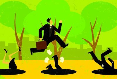 cartoon of a man in a suit jumping over pits