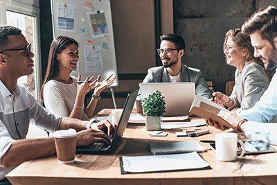 buisness meeting with individuals interacting with eachother