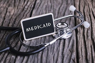 medicaid written on chalkboard