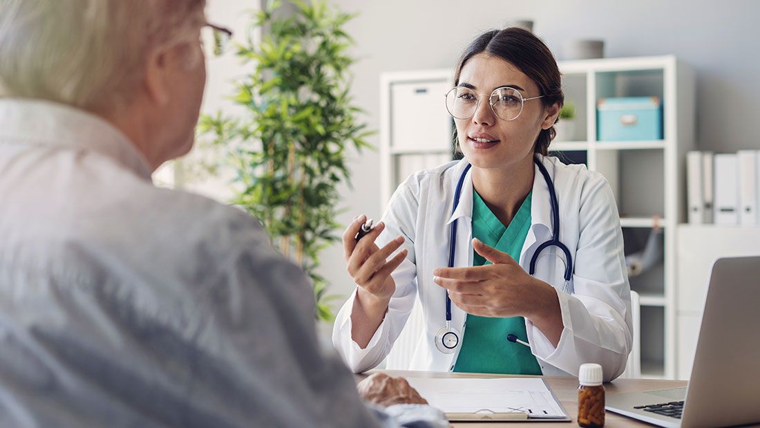 Medicare - Doctor speaking to a senior patient