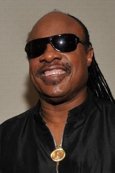 Stevie Wonder smiling for the camera 