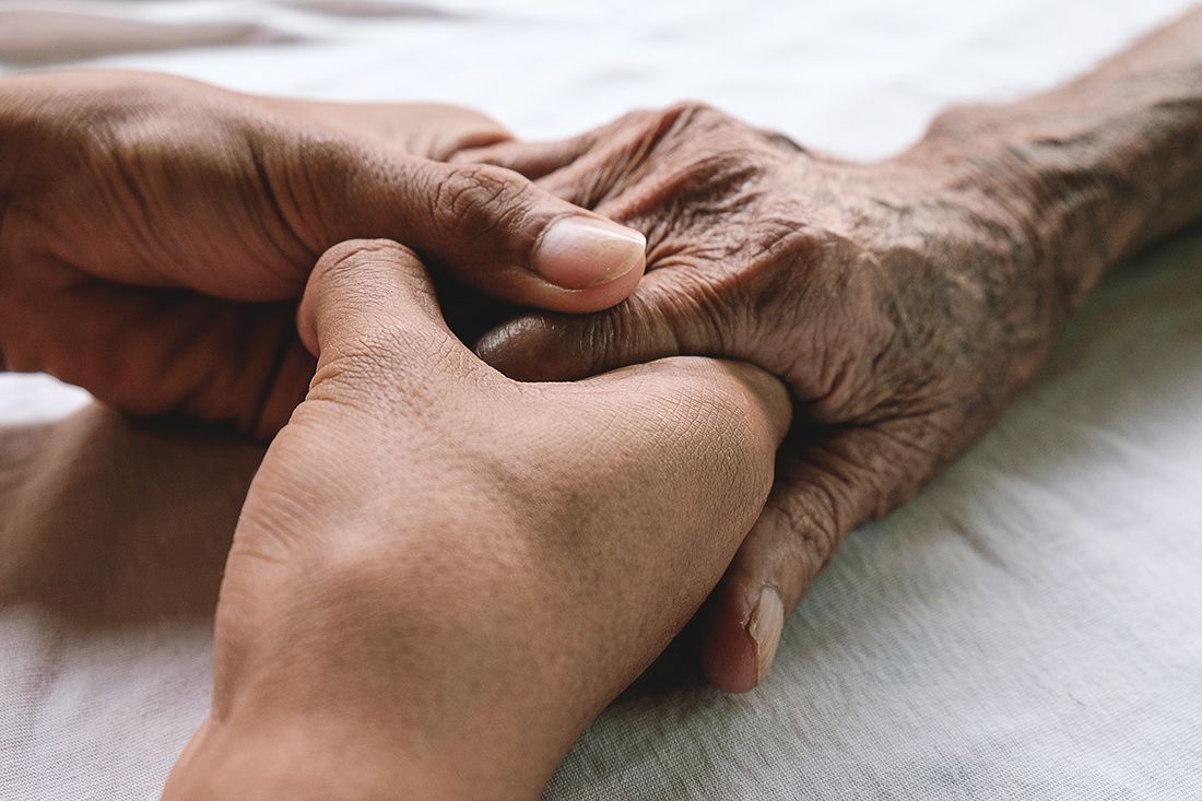 an holder couple holding hands