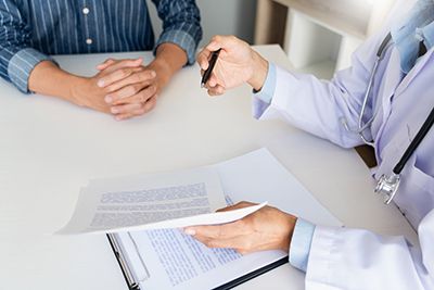 an attorney going over an advance directive with a client