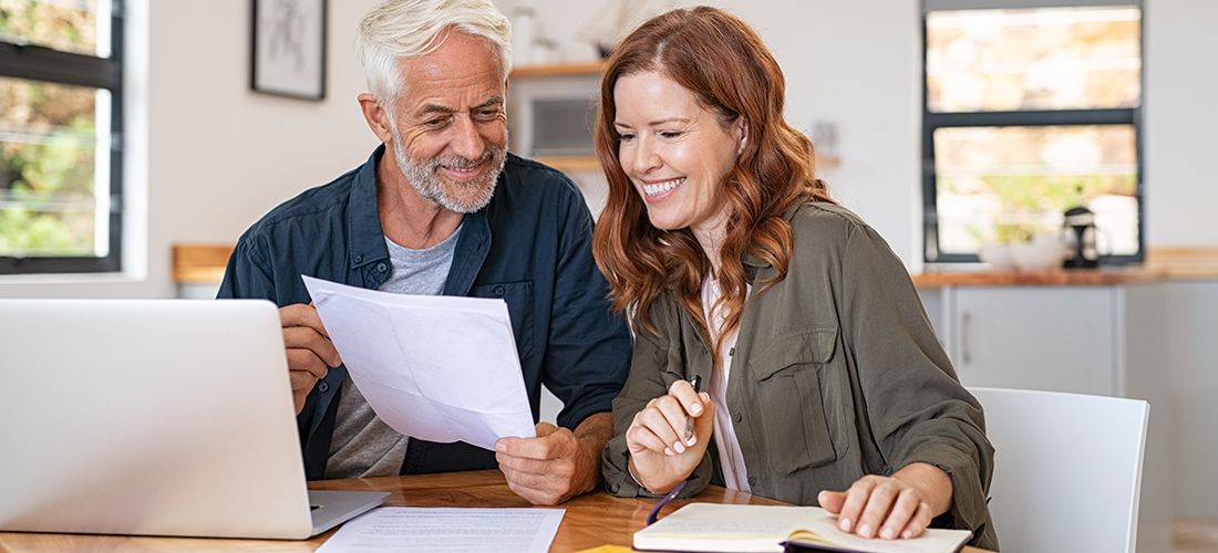a couple comparing power of attorney and successor trustee documents
