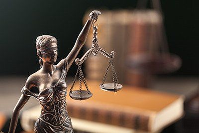 lady justice to represent updating your estate plan after marriage