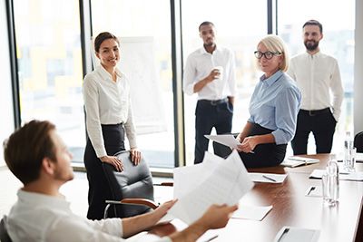 a group of business people having a meeting