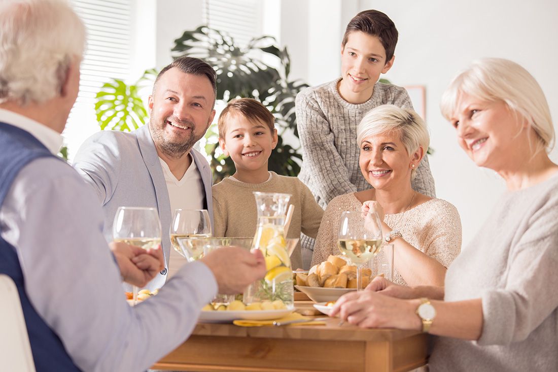 a family sitting down for dinner