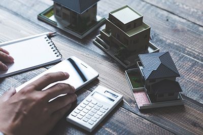 someone doing calculations for a revocable living trust
