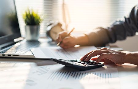 Estate Plan - Individual working on their finances