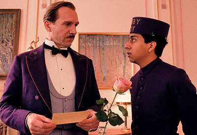 manager speaking to concierge