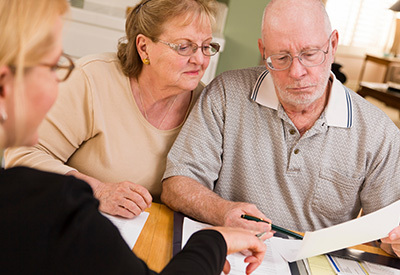 elderly couple learning about estate planning