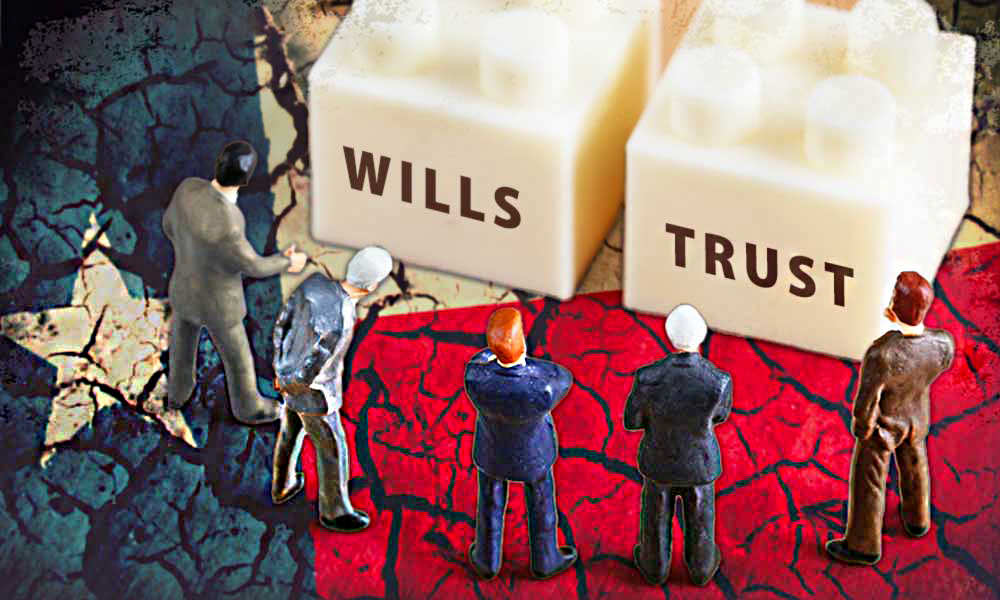 toy figure people looking at two toy blocks labeled wills and trust