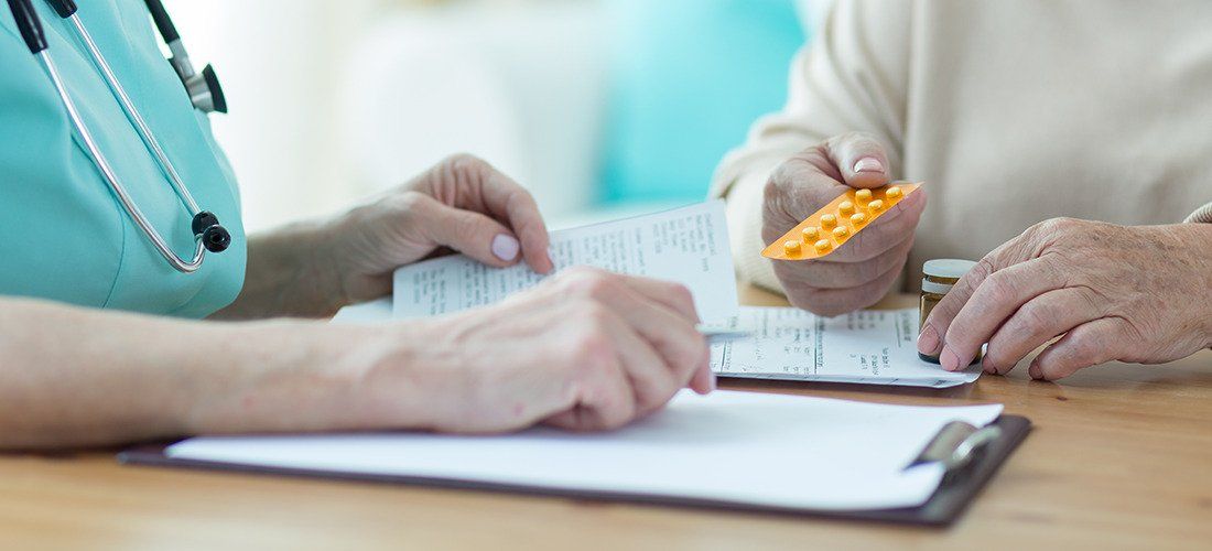 Nurse providing a patient with medication