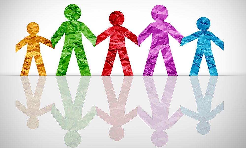 different color paper cut outs of silhouettes of people