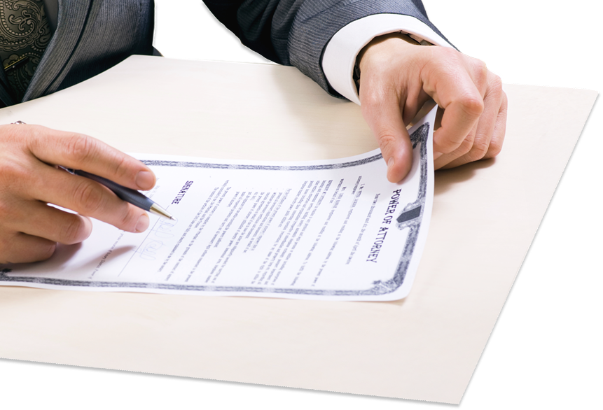 close up of person signing POA document