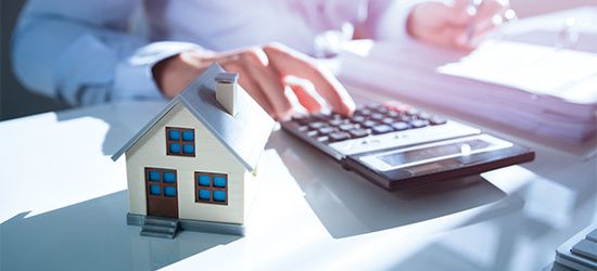 Using a calculator to calculate finances